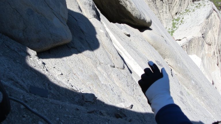 look for cracks loose rocks